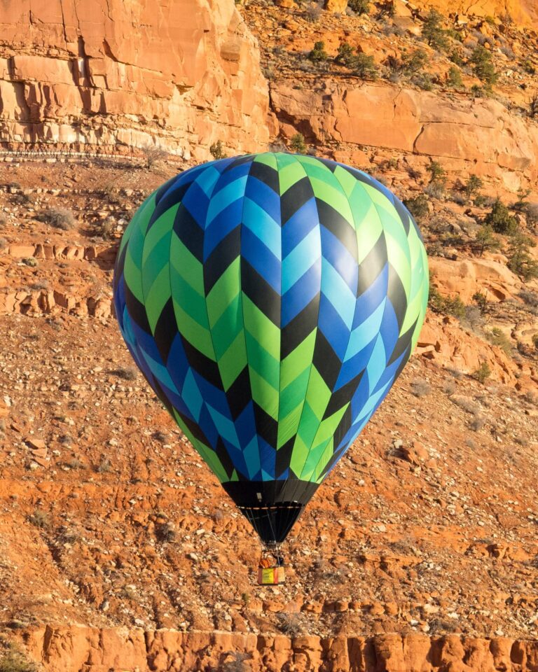 Soarenity against red rock formations